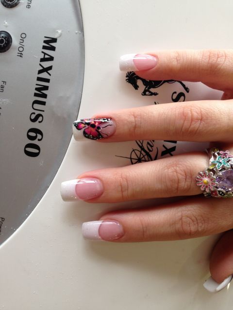 Sheer pink French acrylics with a hand-painted butterfly accent nail