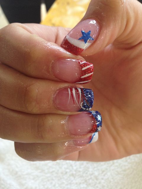 Red and blue glitter tips with white stripes and a star